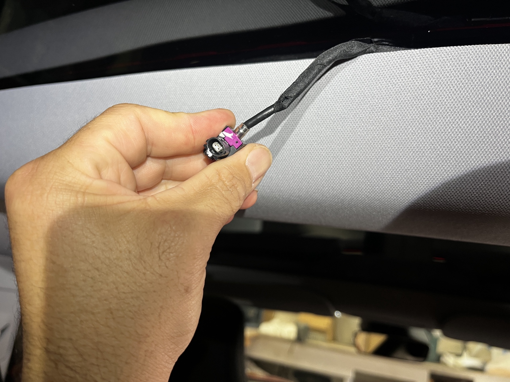 FAKRA RF connector disconnected from Tesla Model 3 headliner