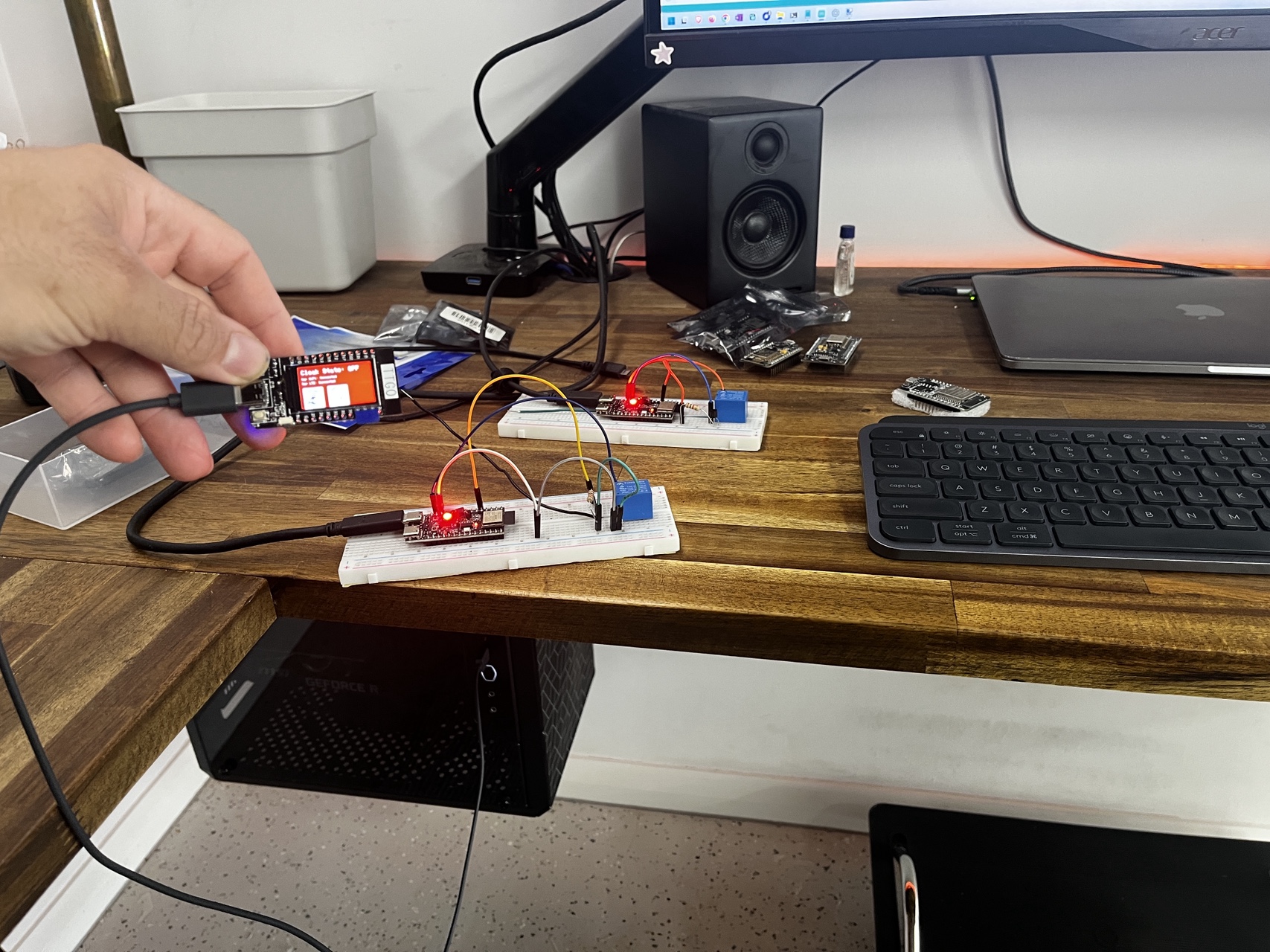 CarCloak v1 prototype on the workbench with ESP32 master and slave units