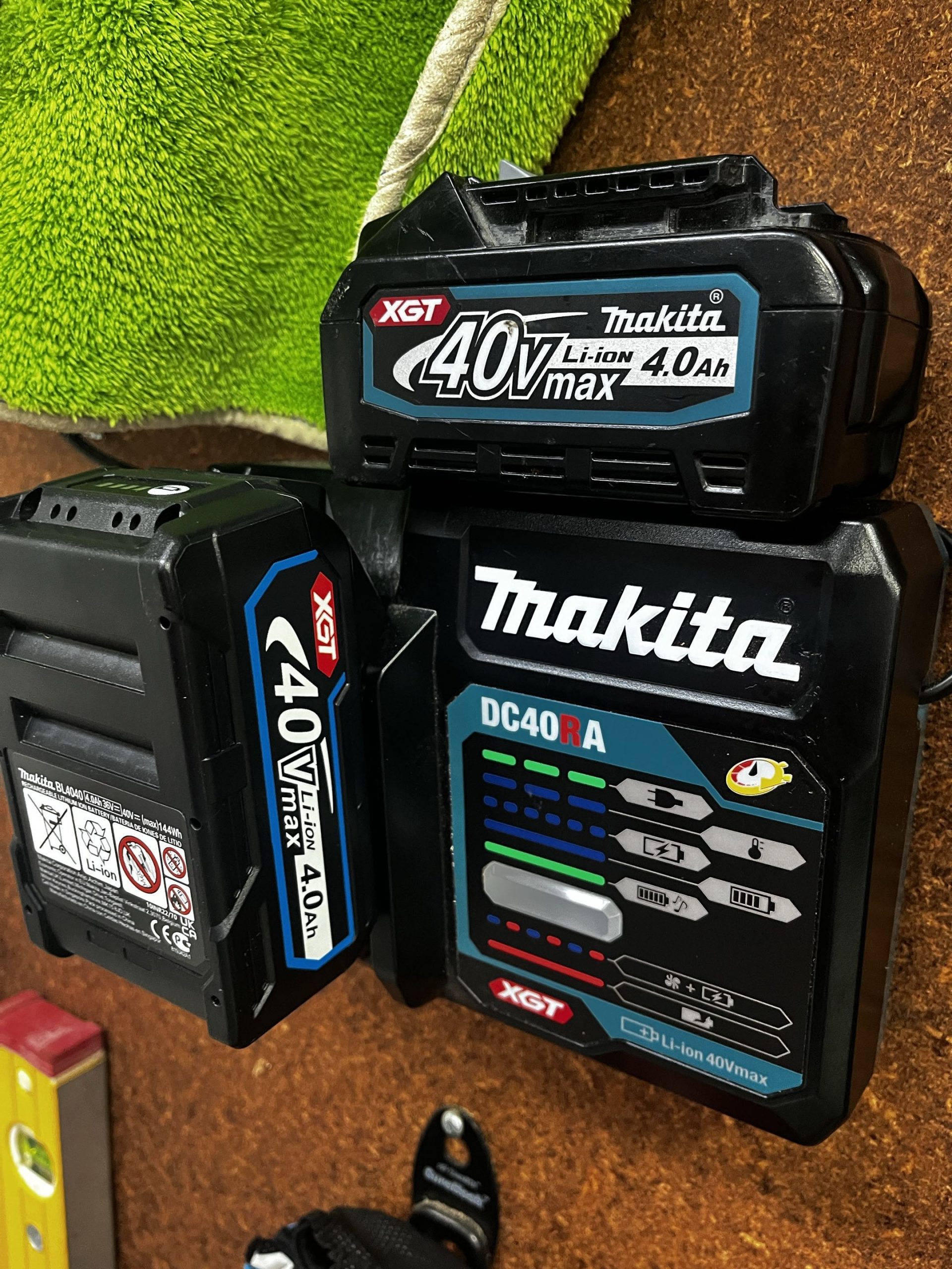Two completed DIY Makita 40V XGT batteries with DC40RA charger