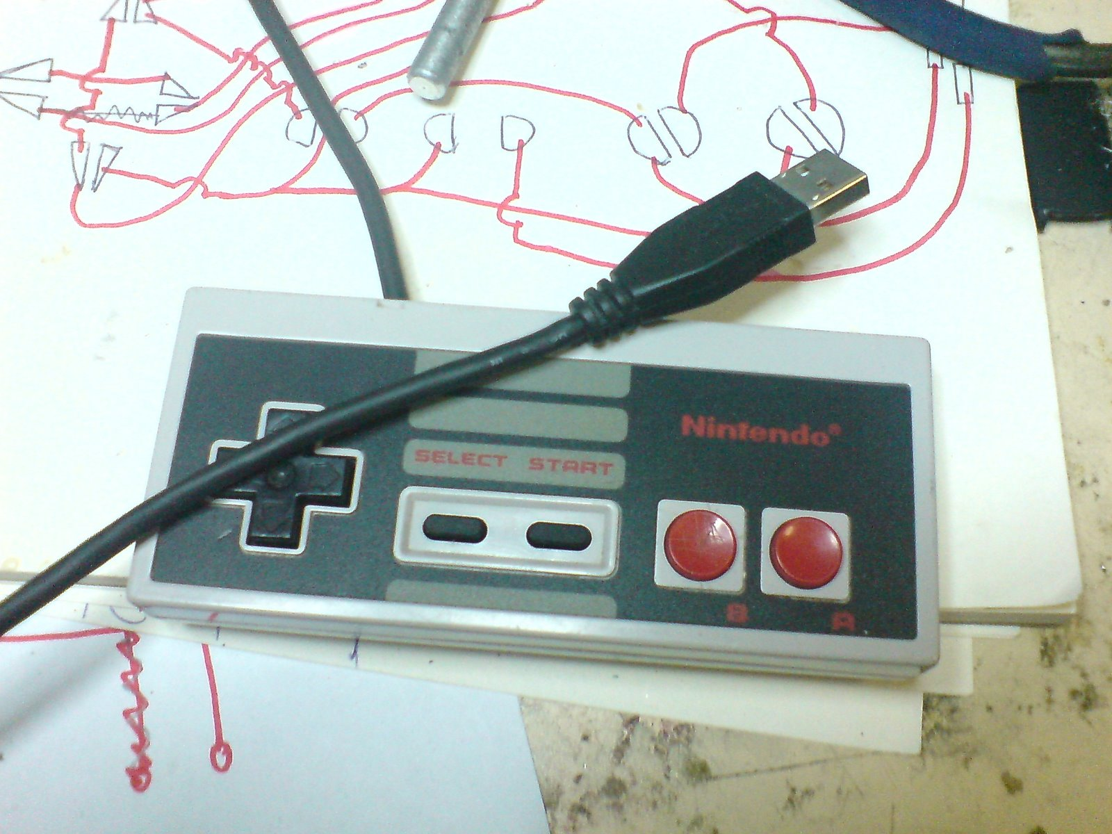 The finished NES USB controller with black USB cable